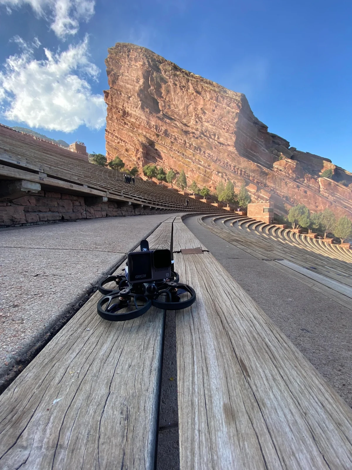 FPV drone services at a live concert — Cinewhoop with propeller guards over the stage by FPV NYC